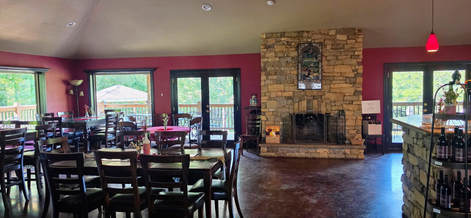 Apple Creek Winery tasting room with stone fireplace