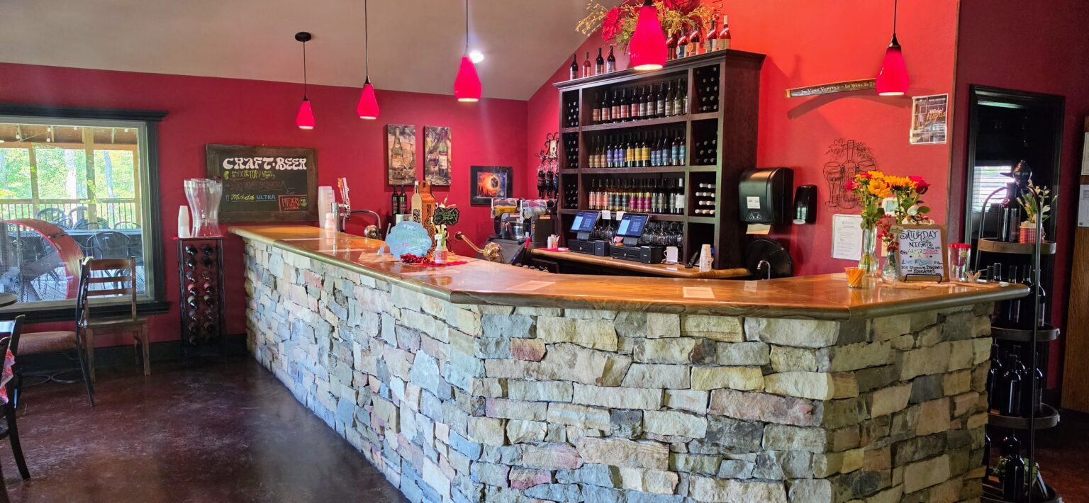 Apple Creek Winery stone bar with wine selection